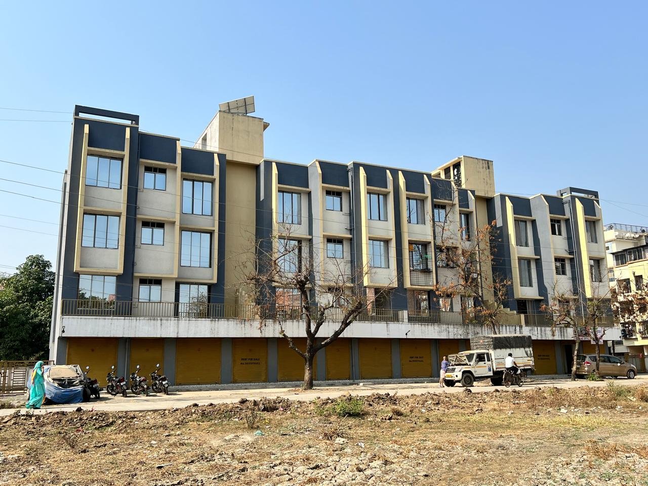 Completed Aadharshila Group residential and commercial building exterior